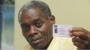 Lloyd Bogle shows his UK driver’s licence to the Observer on Monday. ([PHOTO: BRYAN CUMMINGS)