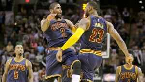 Cleveland Cavaliers Kyrie Irving (2) and LeBron James (23) celebrate during overtime of Thursday's 128-125 win at San Antonio. Irving scored 57 points, James 31.