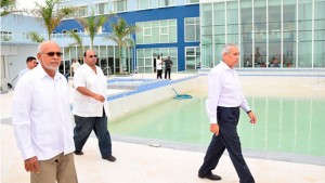 President Donald Ramotar, and Chairman of Atlantic Holdings Incorporated, Winston Brassington being given a tour of the outside of the Marriott Hotel (Credit: GINA)