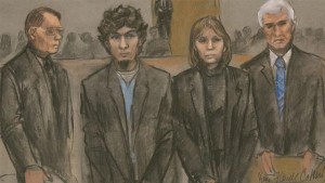 An artist's rendering of Dzhokhar Tsarnaev, second from left, and his defense team as the guilty verdicts on all charges were read in the Boston Marathon bombing trial on April 8, 2015.