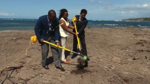 (L-R) Deputy Premier of Nevis and Minister of Tourism Hon. Mark Brantley, Candy Resort’s Local Office Executive Terrelah Byron and Chief Executive Officer (CEO) and General Manager of HTRIP and 1st Director of Caribbean Development Consultant Ltd. (CDCL) Mr. Jian Li break ground for the US$20 million HTRIP Candy Resort Villa Development at Liburd Hill, St. James’ Parish on Nevis on April 17, 2015