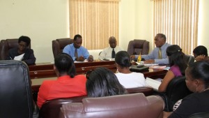 Premier of Nevis and Minister of Education Hon. Vance Amory (at the head of the table) addressing head teachers on Nevis at a meeting at the Ministry of Finance conference room on July 21, 2015. He is flanked by Permanent Secretary in the Premier’s Ministry Wakely Daniel (left), Assistant Secretary Kevin Barett (second from left) and Principal Education Officer Palsy Wilkin (to his right)