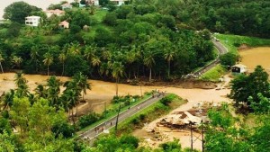 Flooded rivers and collapsed bridges were among the effects of Hurricane Erika. This is the Macoucherie River. (Photo: Prime Minister Roosevelt Skerrit’s Facebook Page)