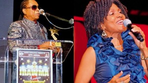 (L) Reggae singer AJ Brown, bearing his award was inducted into the IRAWMA Hall of Fame at the Bailey Hall in Broward College in Florida, on Sunday. (PHOTOS: GAIL ZUCKER) (R) Gospel singer Carlene Davis.