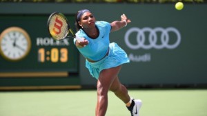 Serena Williams of USA returns the ball to Victoria Azarenka of Belarus in the women's final of the BNP Paribas Open at the Indian Wells Tennis Garden.