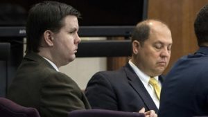 In this October 3, 2016 file photo, Justin Ross Harris, left, listens to jury selection during his murder trial at the Glynn County Courthouse in Brunswick, Georgia.