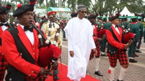 Nigeria's President Muhammadu Buhari (C) arrives at the Presidential Villa in Abuja to mark Nigeria's 56 independence anniversary on October 1, 2016.